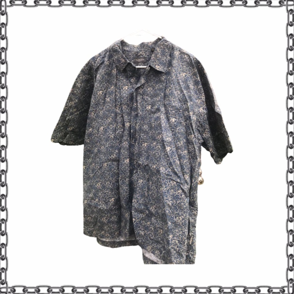 Teal and gold button up with interesting pattern.
